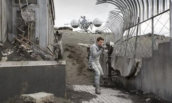 EMPIRE STATE OF MIND: A wary Jack (Tom Cruise) patrols the remains of a New York landmark in Oblivion. (Photo: Universal)