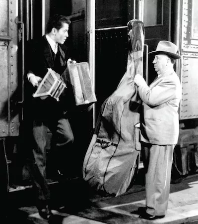 Farley Granger and Alfred Hitchcock on the set of Strangers on a Train (Photo: Warner Bros.)