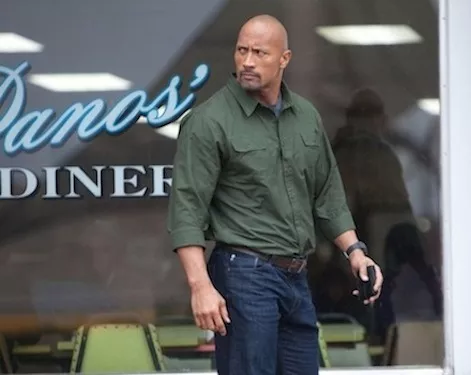 FATHER'S WAY: John Matthews (Dwayne Johnson) tries to salvage his son's future in Snitch. (Photo: Summit)