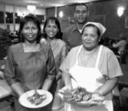 RADOK - From left, Thai Marlai's Toi Rogers, Rachhada Owen, - Robert Rogers and Saowanee Kezich show off a - couple of their specialty dishes, Pohpeah Sod Thai - Marlai and Plajian