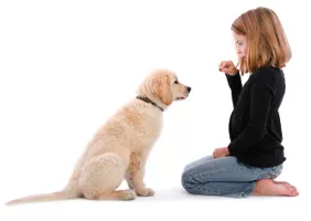 girl-training-puppy