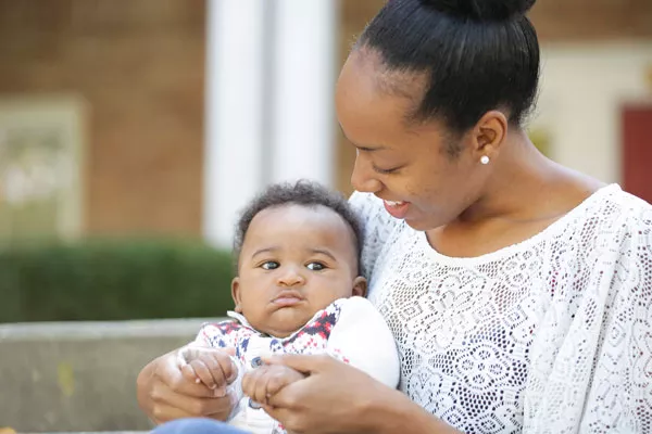 Gloria Miller, 22, with her 5-month-old son Kevin Ringo