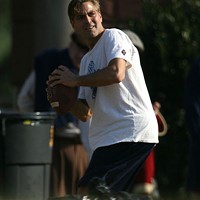 GO LONG: George Clooney gets some quarterback football training in between scenes on set for the upcoming Leatherheads.