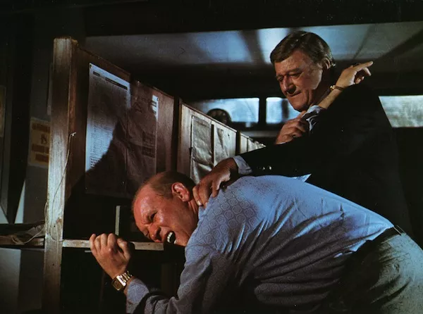 John Wayne (right) in Brannigan (Photo: Twilight Time)