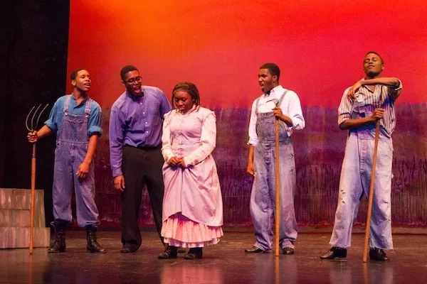 Keston Steele (center) as Celie in NWSAs production of The Color Purple