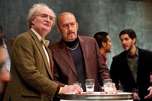 LITERARY DEVICE: Publisher Timothy Cavendish (Jim Broadbent) and his thuggish client Dermot Hoggins (Tom Hanks) attend a book event in Cloud Atlas. (Photo: Warner Bros.)