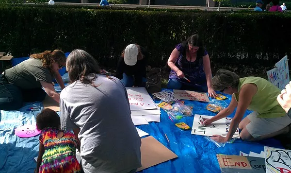 Making signs at the art station on Oct. 8