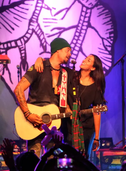 Michael Franti with his girlfriend, Sara Agah.