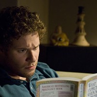 MY FIRST READER Ben Stone (Seth Rogen) gets familiar with baby talk in Knocked Up