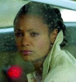 KEN REGAN/UNIVERSAL - NEWTON'S LAW OF GRAVITAS Thandie Newton - contemplates the seriousness of her situation in - The Truth About Charlie