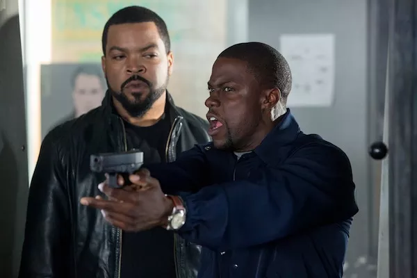 NOT A HOT SHOT: James (Ice Cube, left) learns that Ben (Kevin Hart) isn't exactly at home on the shooting range in Ride Along. (Photo: Universal)