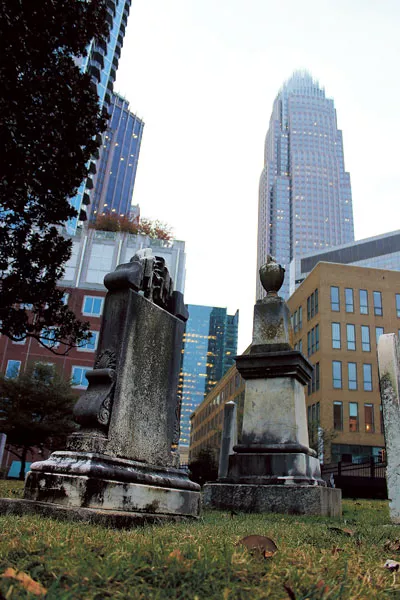 ‘Old Settlers Cemetery with graves from 1776 to 1884 - with the modern Charlotte Skyline’ by Kimberly Casanova