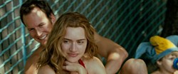 POOL PARTY Brad (Patrick Wilson) and Sarah (Kate Winslet) have fun in the sun in Little Children. - NEW LINE