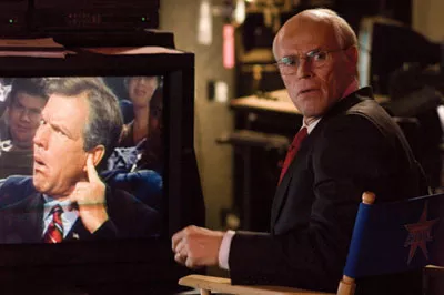 PREZ DISPENSER: The White House Chief of Staff (Willem Dafoe, right) panics after the President's (Dennis Quaid) earpiece malfunctions in American Dreamz