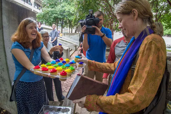 Rainbow cupcakes for everyone! - GRANT BALDWIN