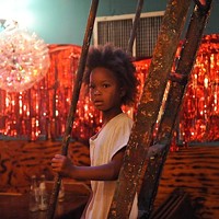 RED LIGHT DISTRICT: Hushpuppy (Quvenzhan&eacute; Wallis) searches for her mother in a house of ill-repute in Beasts of the Southern Wild. (Photo: Fox Searchlight)