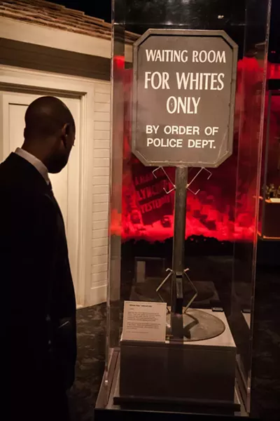 Signs like this one divided the races across the South. There were "white" and "colored" waiting rooms, hospital wards, schools and cemeteries. - JOE MARTIN