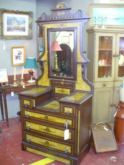 Sleepy Poet Antique Mall - 1845, grain-painted dressmakers chest, - original paint and hardware for $950.00. - 4450 South Blvd. 704-529-6369. - Monday-Thursday 10 a.m.-6 p.m., Friday-Saturday 10 a.m.-8 p.m., Sunday 12 p.m.-5 p.m. - www.sleepypoetstuff.com - Credit cards accepted