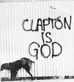 TAKING THE PISS Clapton-anointing graffito
