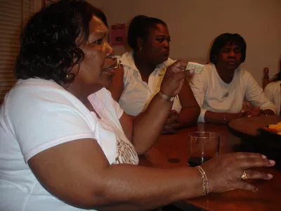 Teresa Shepard, Regina Diane Glover and Katie Glover mourn the death of Teresa and Katie's brother Willie "Junior" Brown - JESSE DECONTO