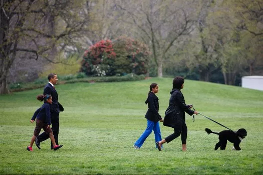 The Obamas and their Portuguese Water Dog, Bo.