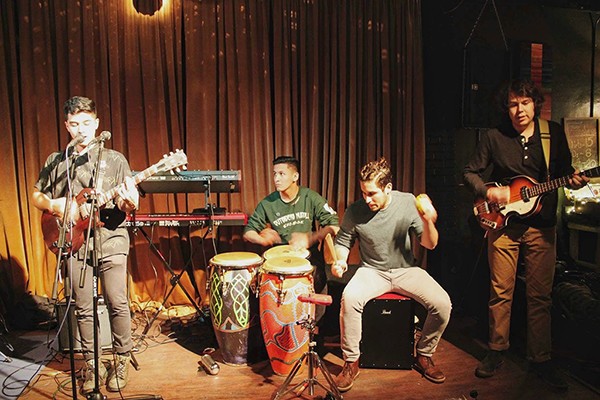 Quisol (from left) with band members Michael David Gonzalez, Randall Davis and Nikolas Maldonado. (Photo by Lex Paige)