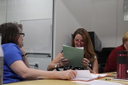 Lane Morris (right) cuts up with Josephine Hall during rehearsal for 'Confidence.'