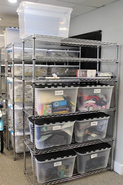 On Ramp stores organized bins of items that are available to clients. (Photo by Courtney Mihocik)