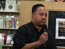 Platt speaks at a recent event at Park Road Books. (Photo by Neel Stallings)