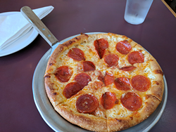 A small pepperoni pizza at House of Pizza