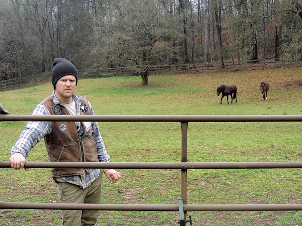 James Tyson on his farm in Southwest Charlotte. (Photo by Ryan Pitkin)