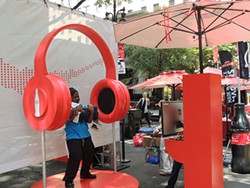 Folks posed for pictures with these headphones only after handing over their phone number. (Photo by Ryan Pitkin)