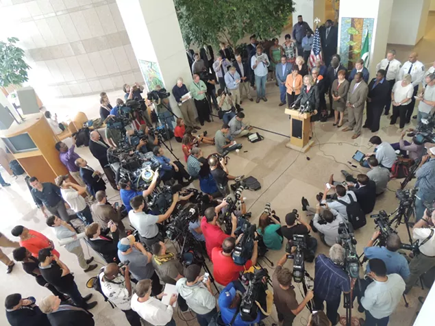 Mayor Roberts addresses national and local media this morning at the Charlotte-Mecklenburg Government Center. - RYAN PITKIN