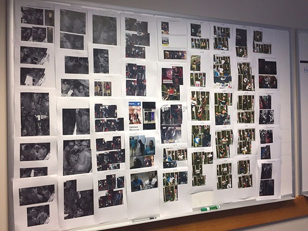 A wall of photos being used by those investigating looting and vandalism cases during unrest following the Keith Lamont Scott killing were taken from surveillance video, news footage and social media feeds.