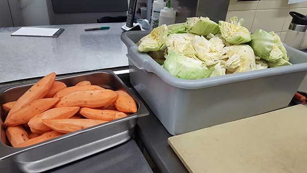 Sweet potatoes and cabbage from Rowland’s Row Farm in Gold Hill can offer fresh winter flavors for creative cooks. - ALISON LEININGER