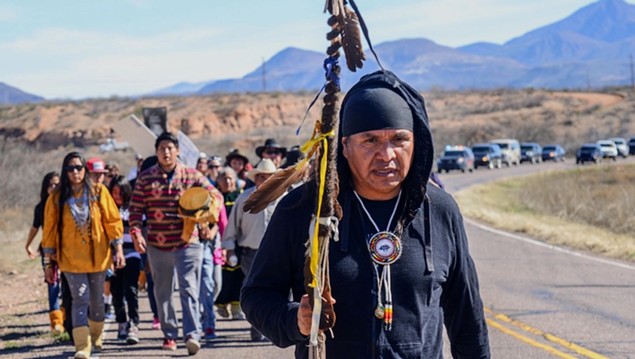 Wendsler Nosie, Sr., leads a march from the San Carlos Apache Reservation to a sacred and now endangered site called Oak Flat. - COURTESY OF APACHE STRONGHOLD