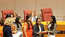 Dimple Ajmera (far right) stands with family as she’s sworn in as District 5 representative in January.