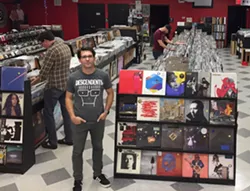 Wishart inside his shop on Descendents T-shirt Day. (Photo courtesy of Lunchbox)