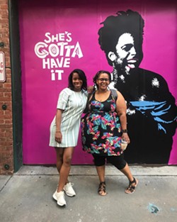 Rose (right) with Janelle Williamson of Spike Lee's 40 Acres staff.