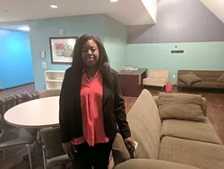 Tenille Banner in a common area at the Clyde and Ethel Dickson Domestic Violence Shelter. (Pitkin)