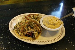 A Krazy Fish favorite: salmon tacos with jalapeno cheddar grits.