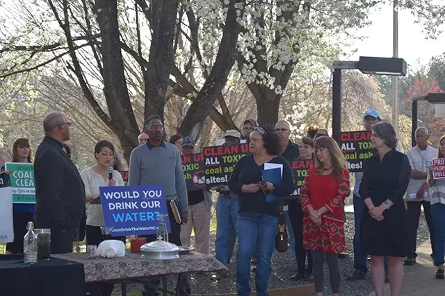 Members of the Alliance for Carolinians Together Against Coal Ash gather near Belews Creek Steam Station.