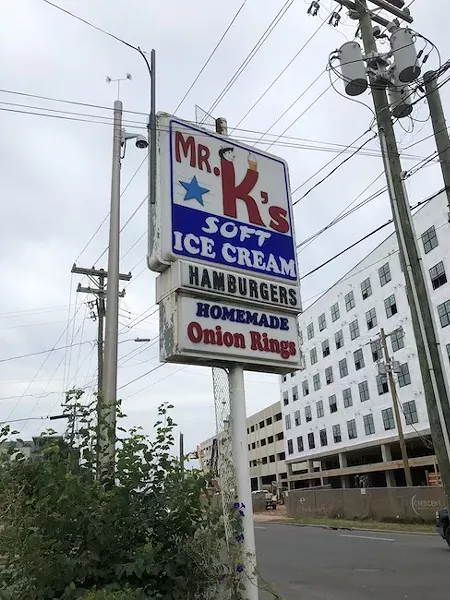 The classic sign out front is already dwarfed by nearby development. (Photo by Sohpie Whisnant)