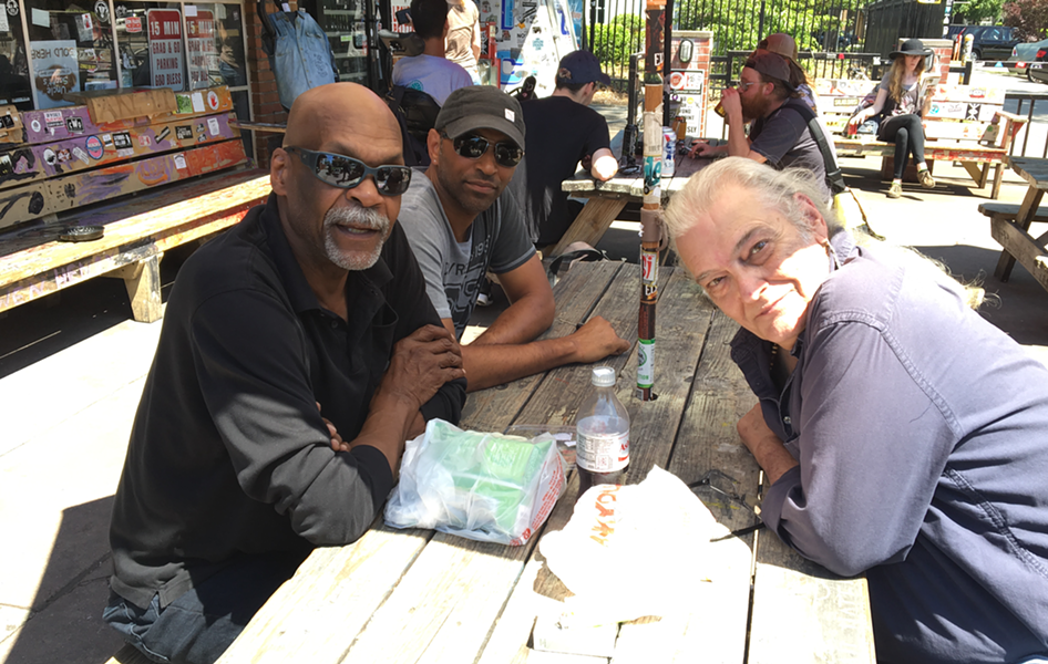 The core original members last month at Common Market in Plaza Midwood. From left: Blackwell, Lindsay and Brock. (Photo by Mark Kemp)