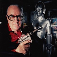 MAN AND MACHINE: Forrest J Ackerman with a replica (background) from his favorite movie, the silent classic Metropolis.
