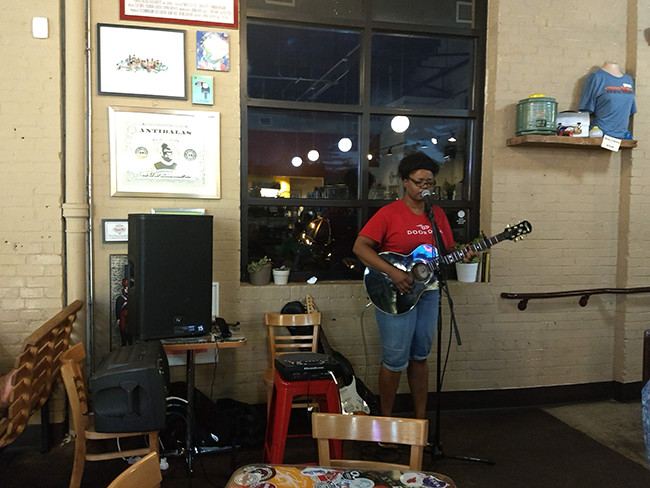 Johnson performs at the Rhino Market. (Photo by Kia Moore)