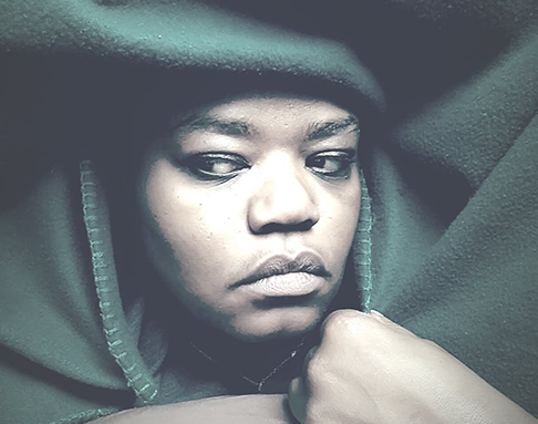 Randi Johnson under covers. (Photo courtesy of Randi Johnson)
