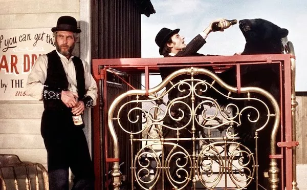 Paul Newman, Roddy McDowall and Bruno the Bear in The Life and Times of Judge Roy Bean (Photo: Warner)
