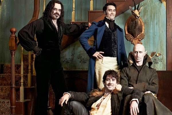 Jemaine Clement, Taiki Waititi (both standing), Jonathan Brugh and Ben Fransham in What We Do in the Shadows (Photo: Paramount)