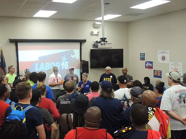 MaryBe McMillan (with microphone) addresses volunteers at the Labor 2016 mobilization kick-off. - RYAN PITKIN